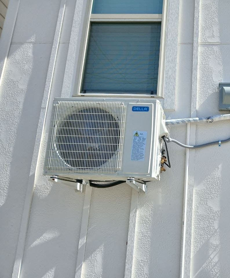 Wall-mounted condenser install